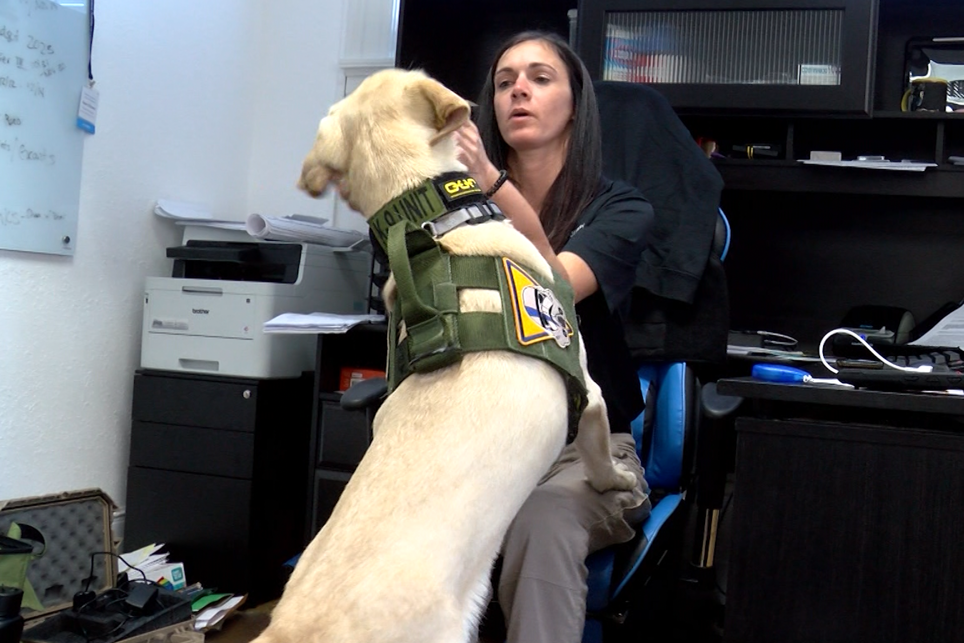 Bogey, a K9 officer, and her handler, Karen O'Connor, of the Knox County High Tech Crime Unit