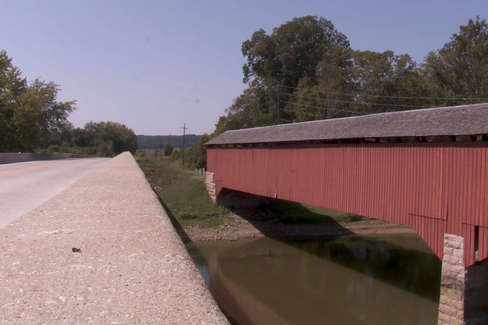 Jackson County Medora Covered Bridge runs parallel with St. Road 235 and crosses over The East Fork White River