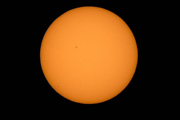The planet Mercury is seen in silhouette, lower third of image, as it transits across the face of the sun Monday, May 9, 2016, as viewed from Boyertown, Pennsylvania. 