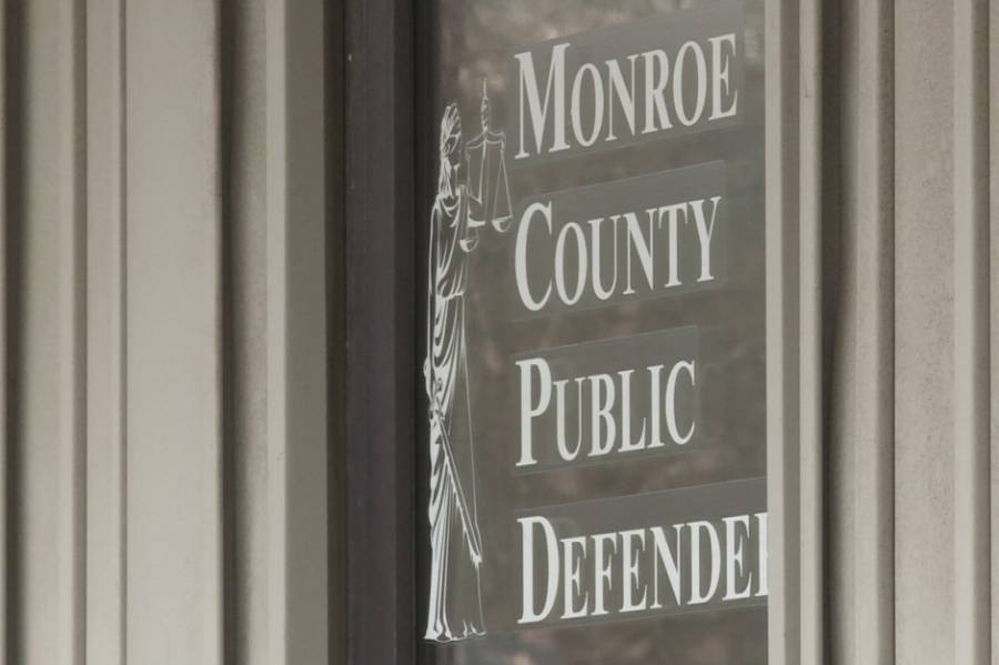 monroe county public defender sign