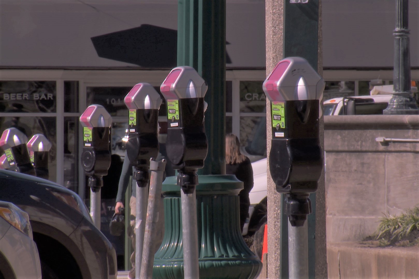 Vandalized parking meters in downtown Bloomington.