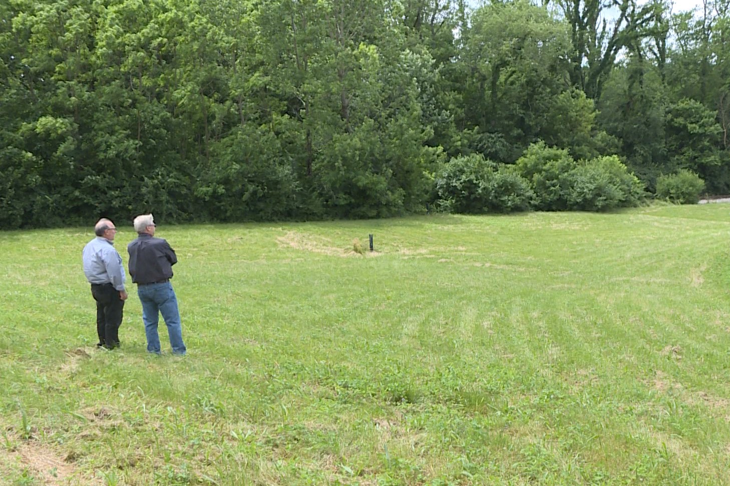 Bob Zaltsburg and John in a field.