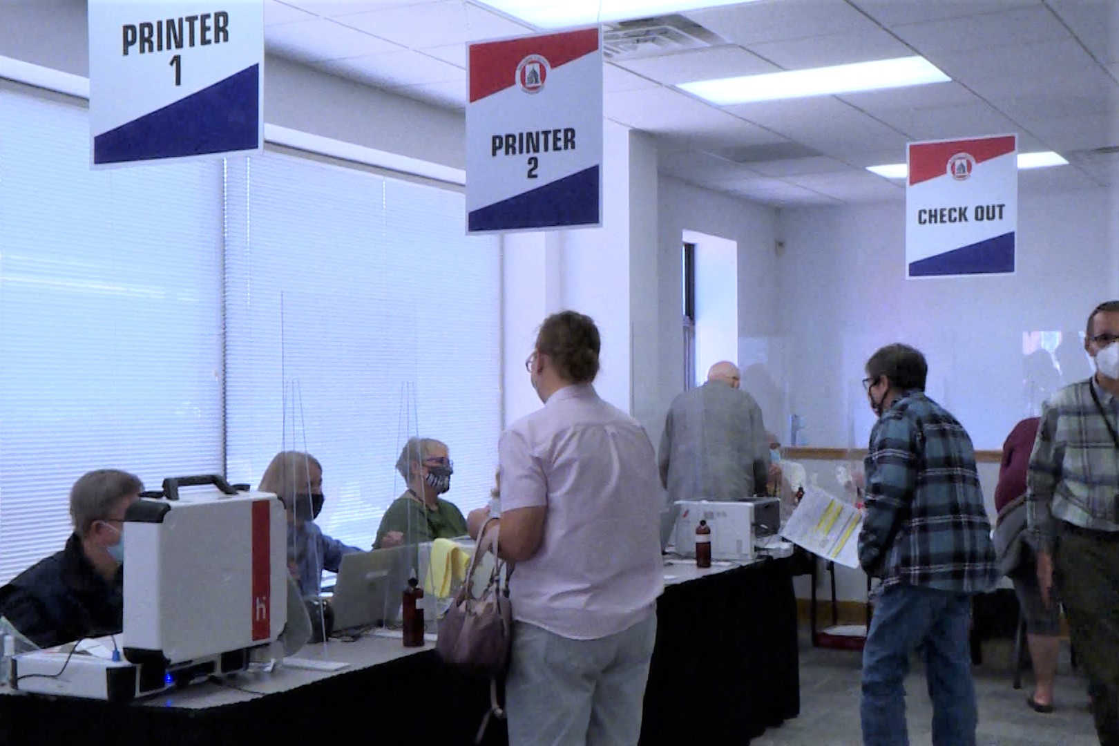 A photo of people voting inside Monroe County's Election Central.