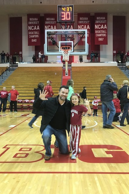 Brendan Pickens on the court of Assembly Hall with his daughter.