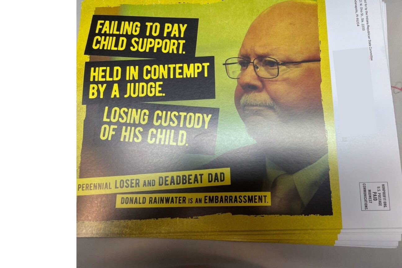 Mailer ad featuring Donald Rainwater that reads "Failing to pay child support. Held in contempt by a judge. Losing custody of his child. Perennial loser and deadbeat dad Donald Rainwater is an embarrasment."