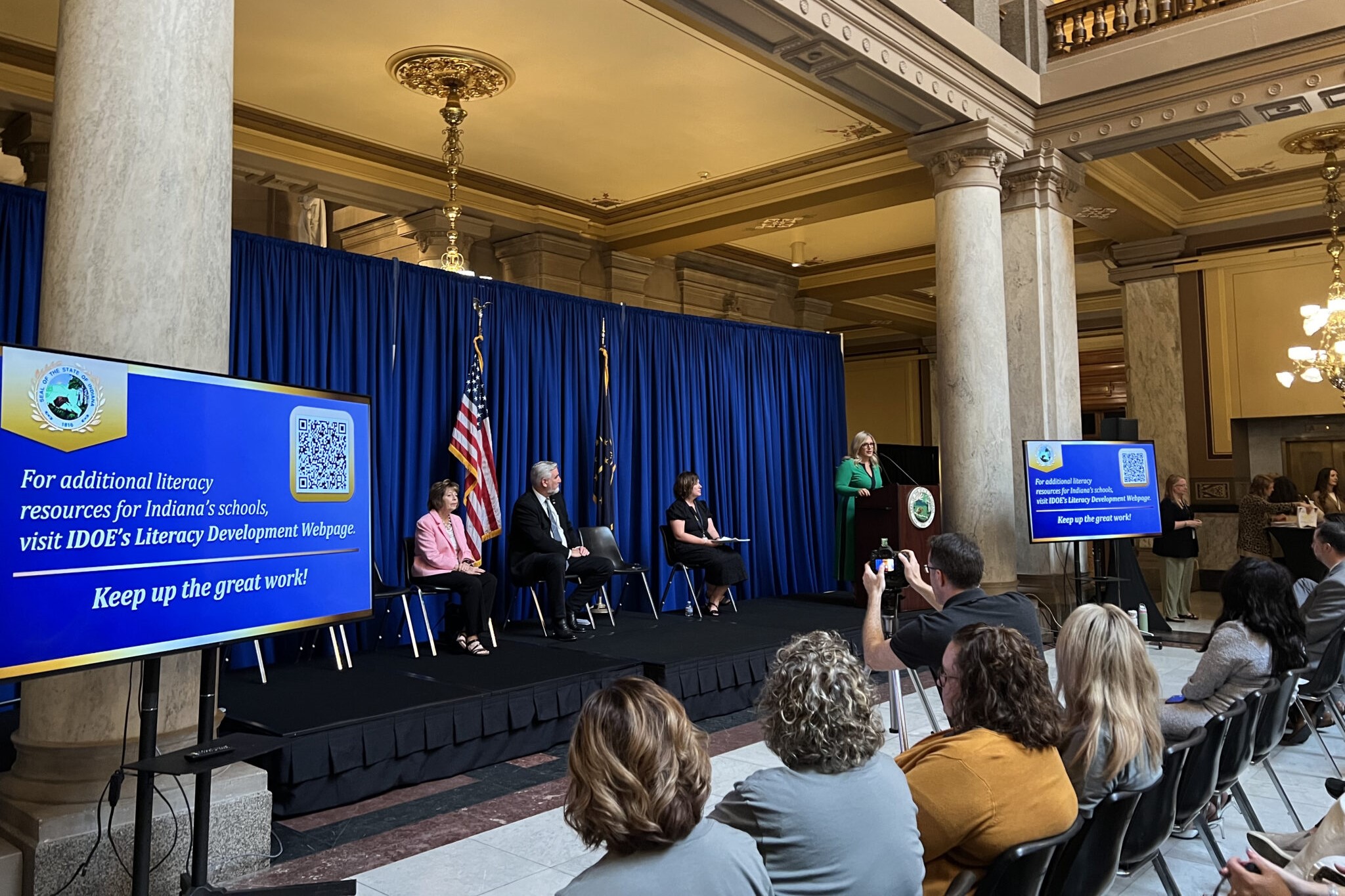 Indiana Secretary of Education Katie Jenner, along with Gov. Eric Holcomb and several state lawmakers at the reading ceremony at the Indiana Statehouse