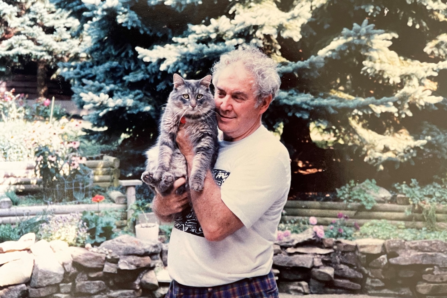 Rudy Pozzatti with his cat, Elvis.