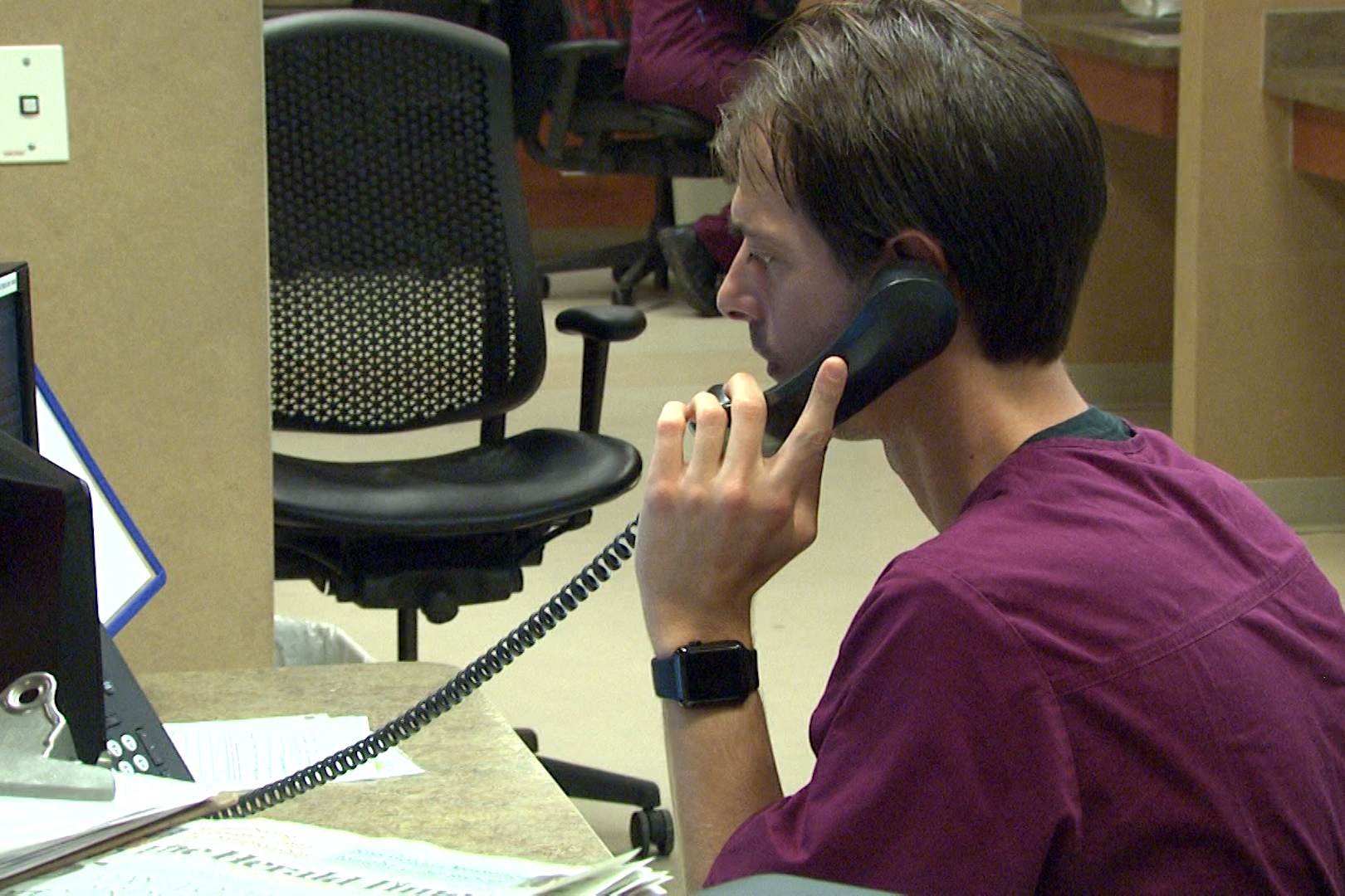 medical worker on phone