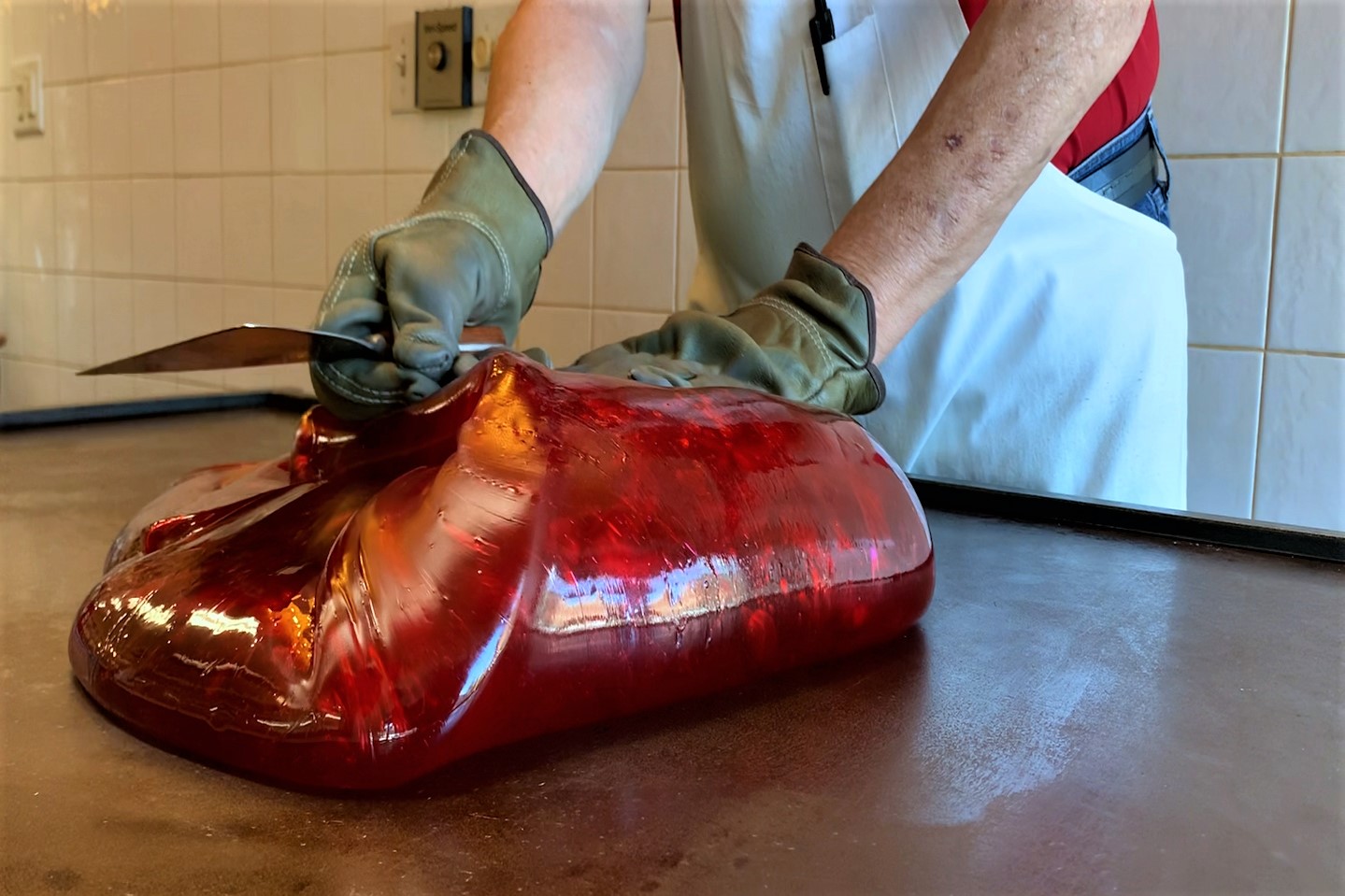 An employee at Schimpff's Confectionary makes hard candy.