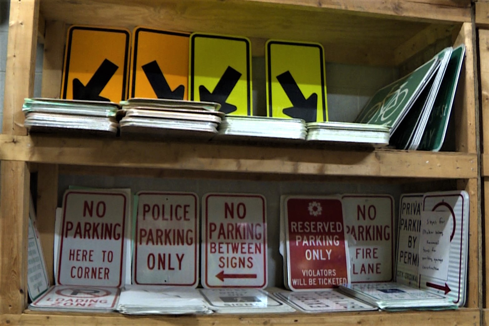 A shelf of street signs at the City of Bloomington's transportation center.