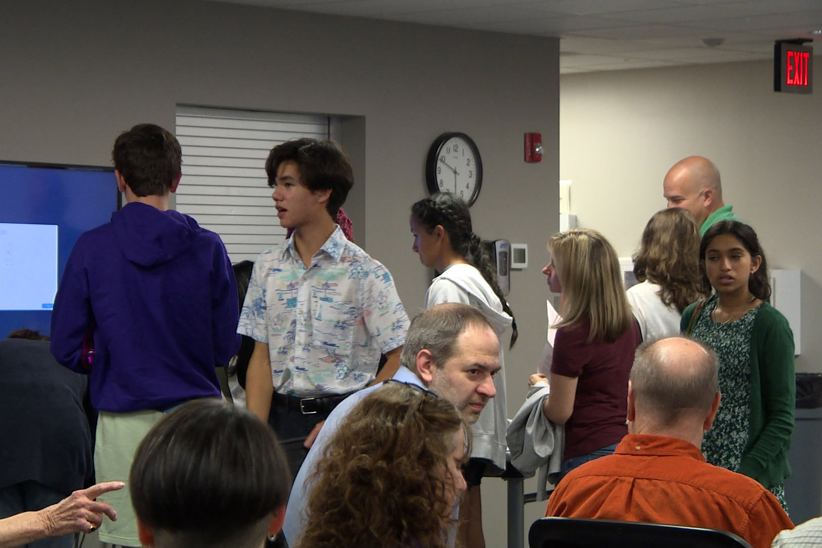 Bloomington students line up to speak during Tuesday night's school board meeting.