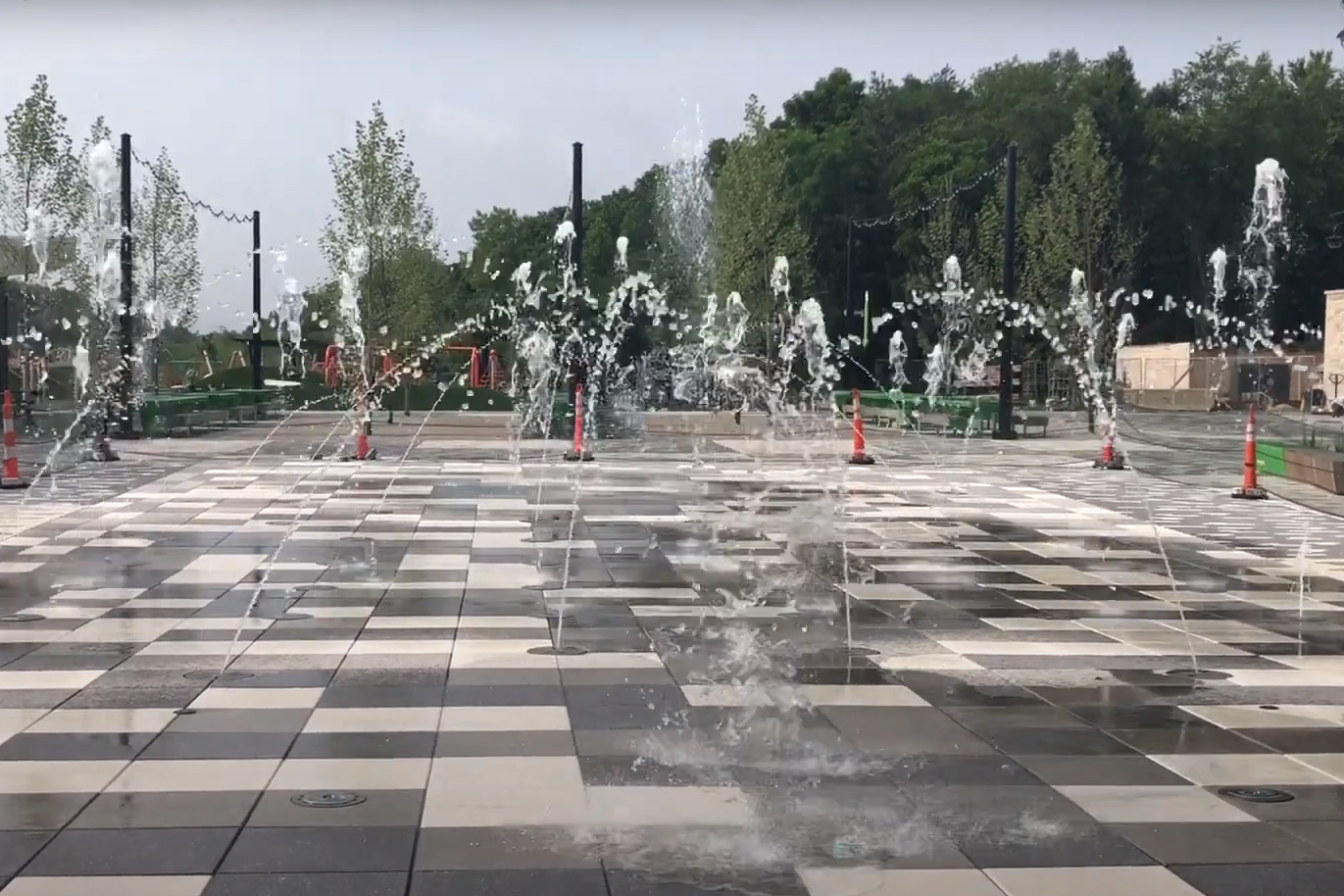 A still from the City of Bloomington's promotional video of the new splash pad at Switchyard Park.
