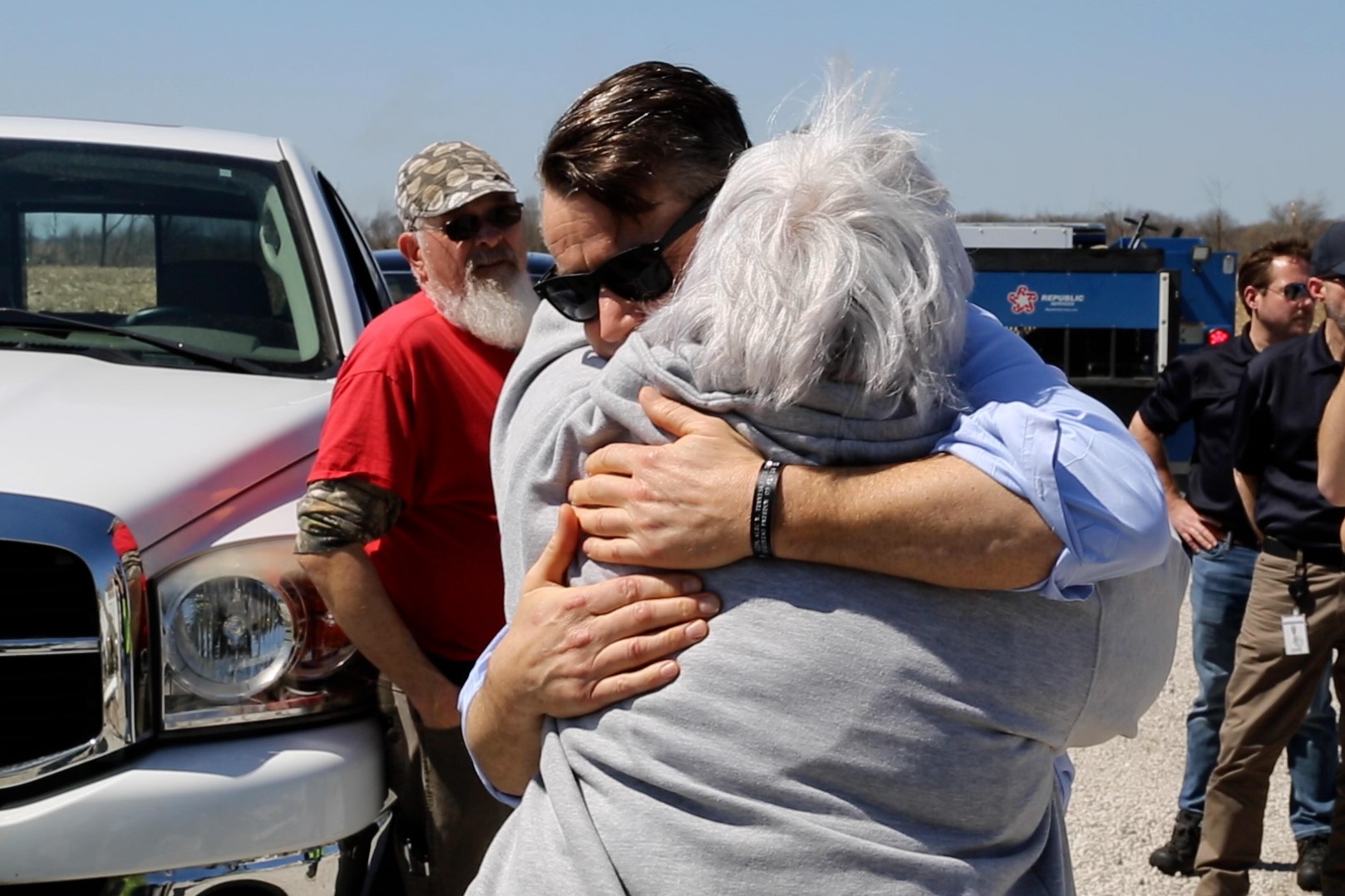 young hugging woman at tornado