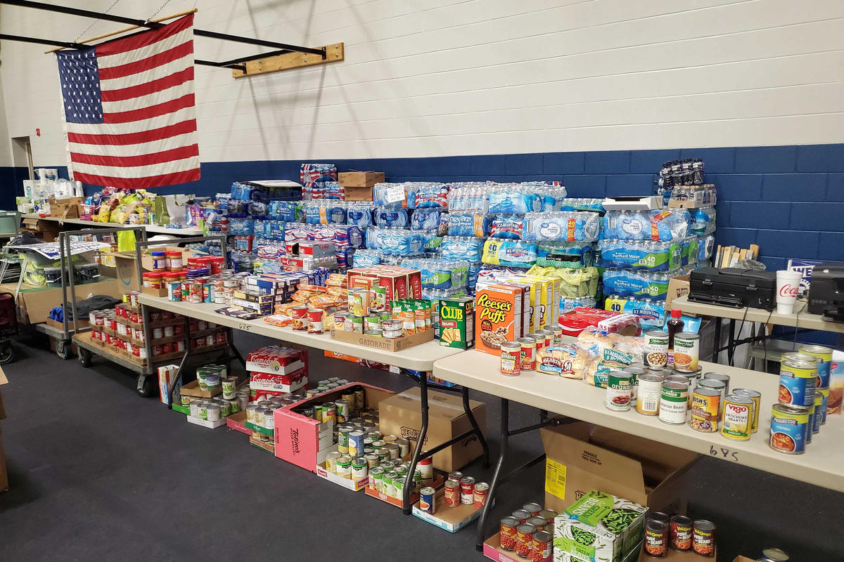 A food pantry is set up in gym of the UAW Local 685 union hall from food donated to help members in need during the strike against General Motors.