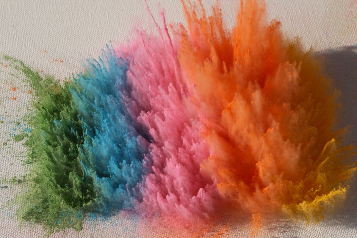 Bright rainbow Holi powder background 2