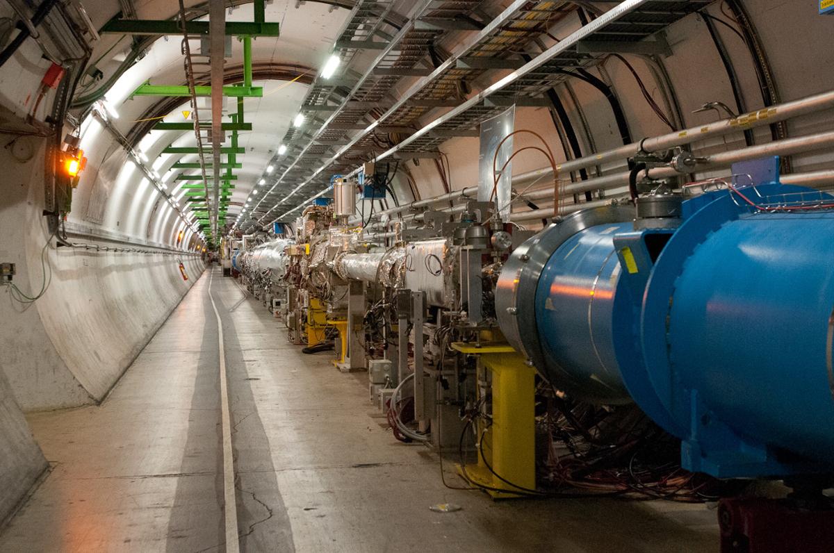 A long tunnel full of equipment in the CERN facility