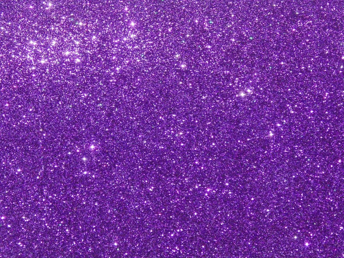 Sparkly, purple glitter covers the entire image
