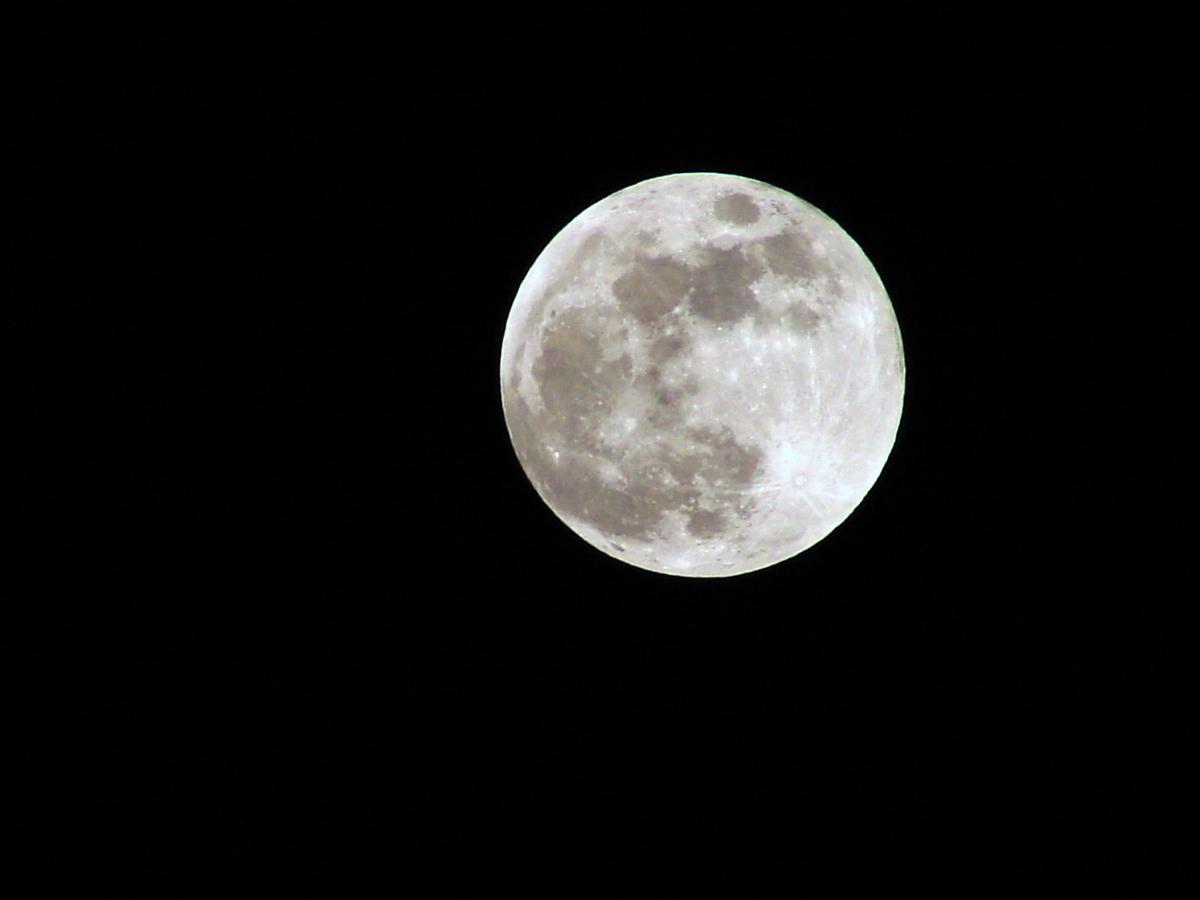 The full moon with a black background