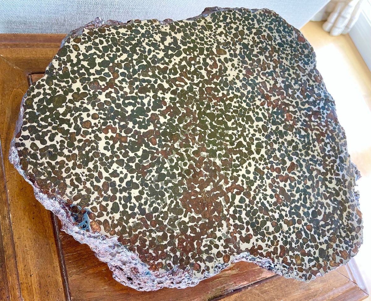 A pallasite slab of iron material formed in space