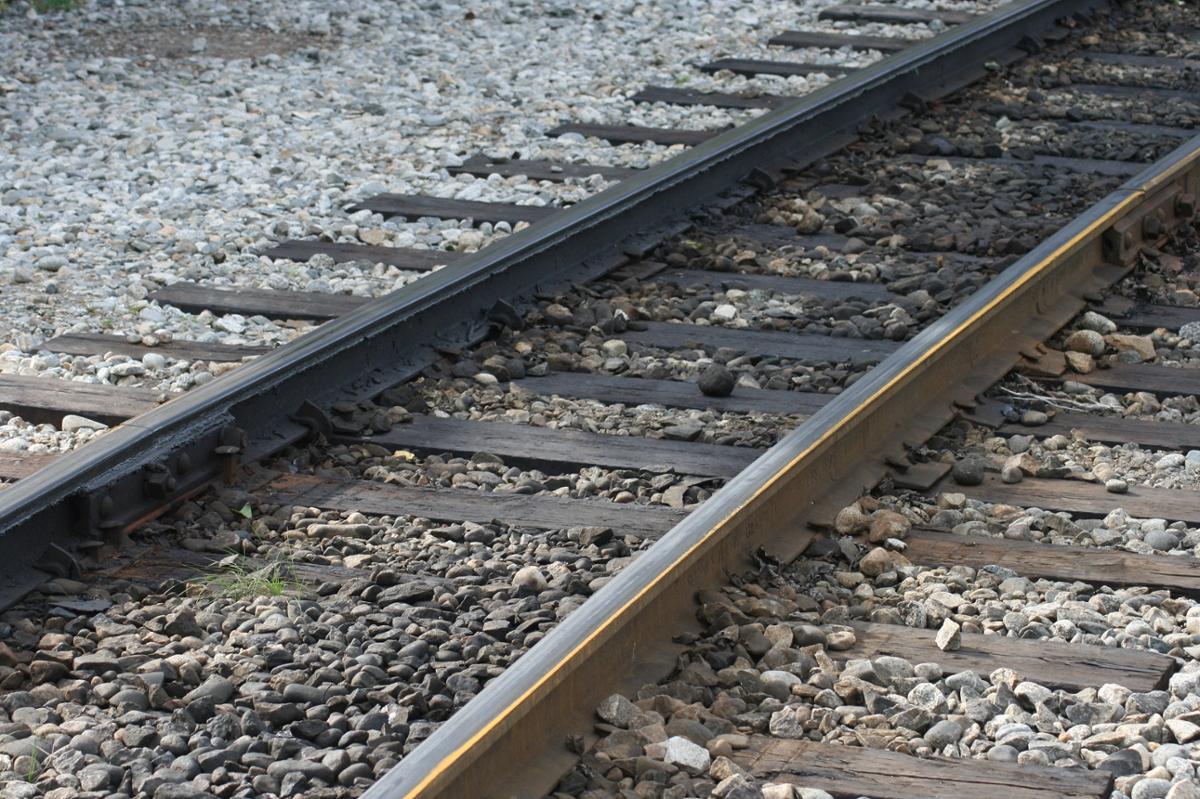 Closeup of railroad tracks on a gravel surface