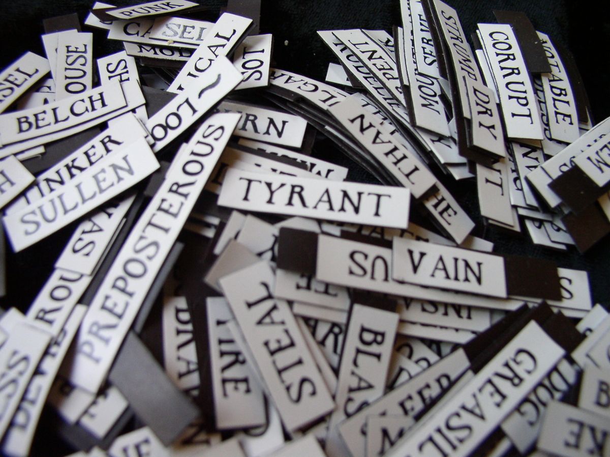 A pile of cut out words commonly seen in Shakespeare's work