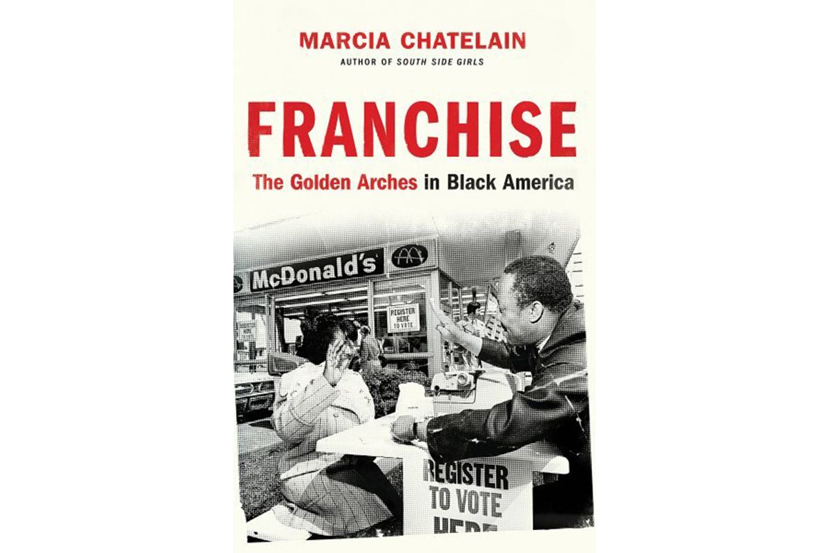 Book cover for Franchise: The Golden Arches in Black Ameria, with a grainy black and white photo of two African American people facing each other with one hand up, over a counter a Vote Here sign and McDonald's signage in the background