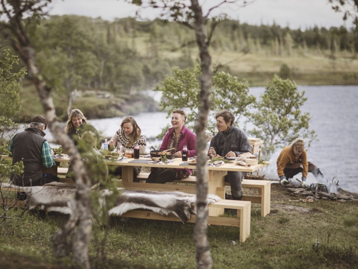 Swedish people enjoying an outdoor meal 