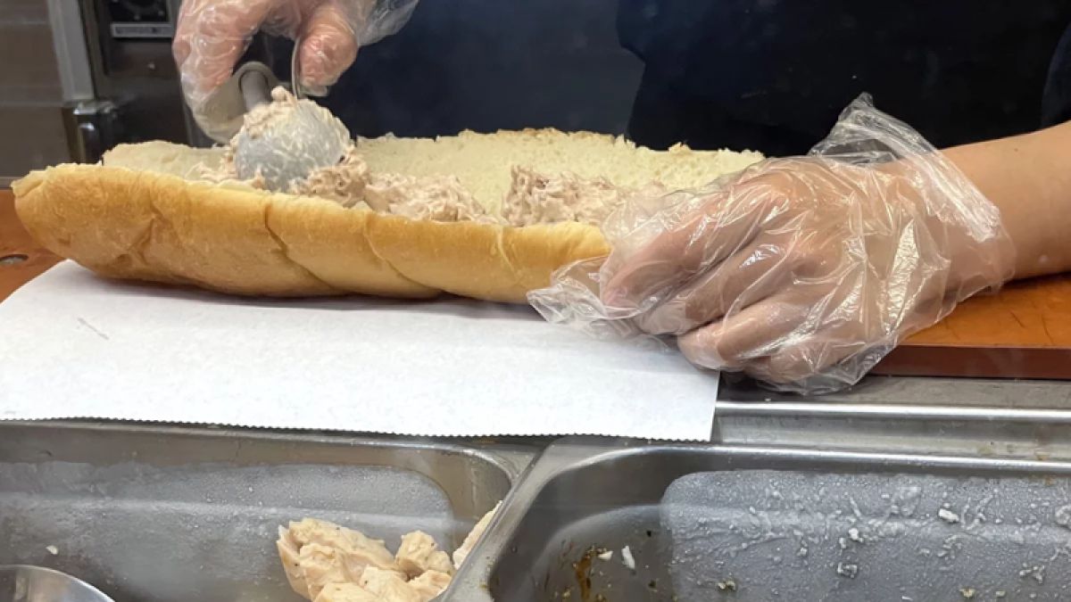 A Subway Tuna Sandwich being prepared