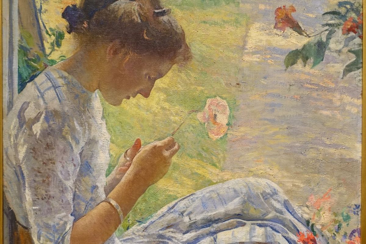 Close up of the painting “Mercie Cutting Flowers” by Edmund Charles Tarbell, 1912.