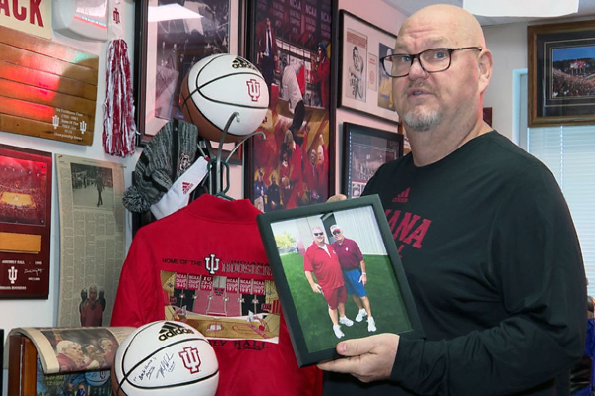 One of Todd Reid's prized photos is of him and former coach Bill Mallory.