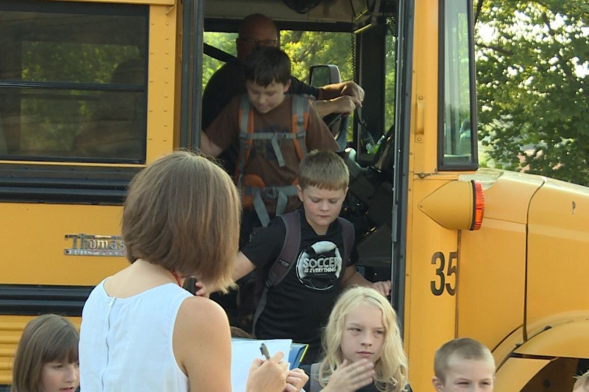 kids get off a bus