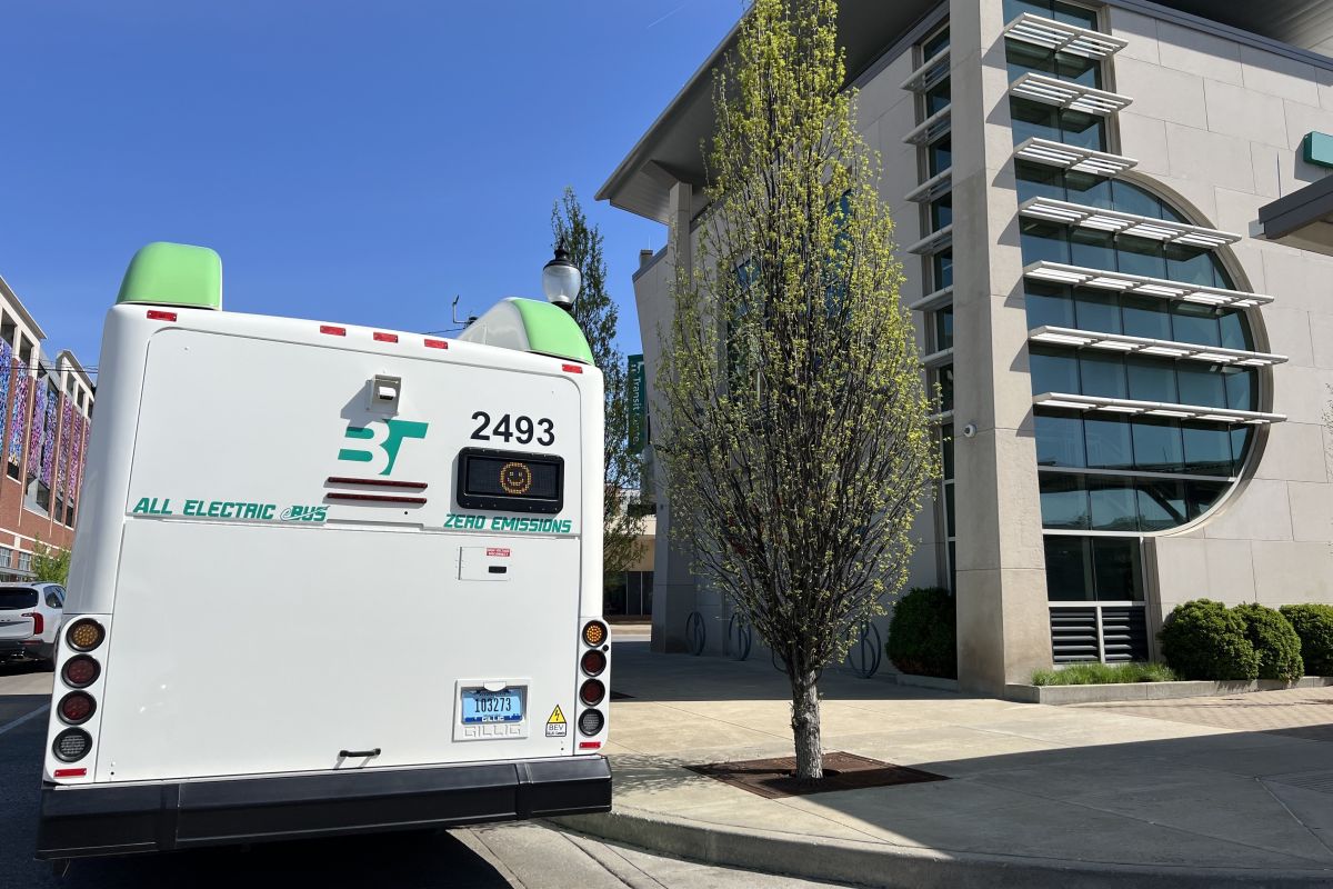 A Bloomington Transit electric bus in front of the Transit Center.
