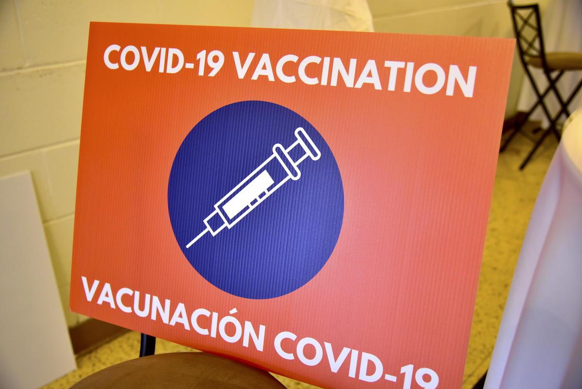 A covid-19 vaccine clinic sign.