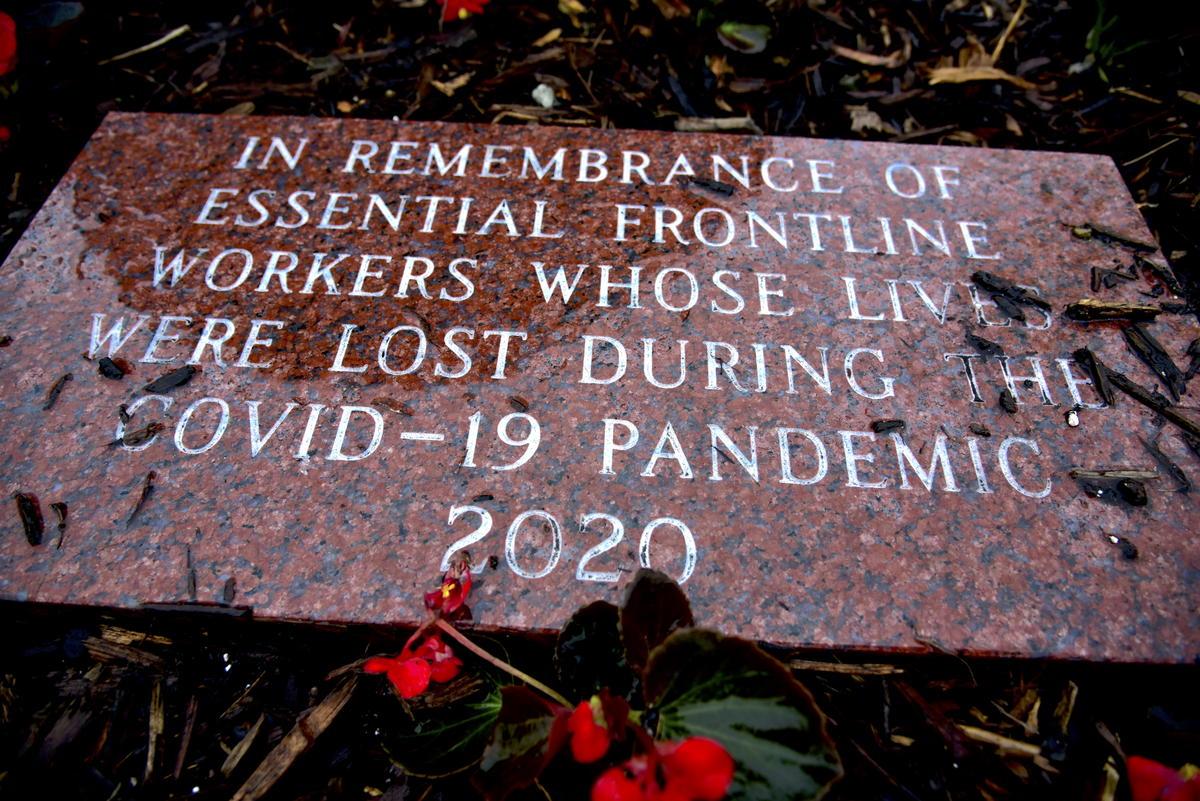 A memorial to essential workers who died in the pandemic was dedicated at Howard Park in South Bend.