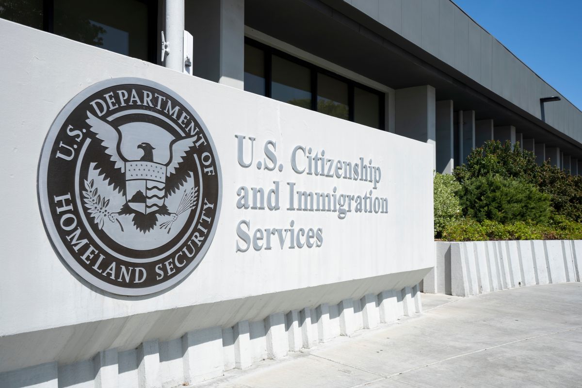 Santa Clara, CA, USA - Apr 30, 2022: Closeup of the U.S. Citizenship and Immigration Services (USCIS) sign seen outside of the USCIS San Jose Field Office in Santa Clara, California