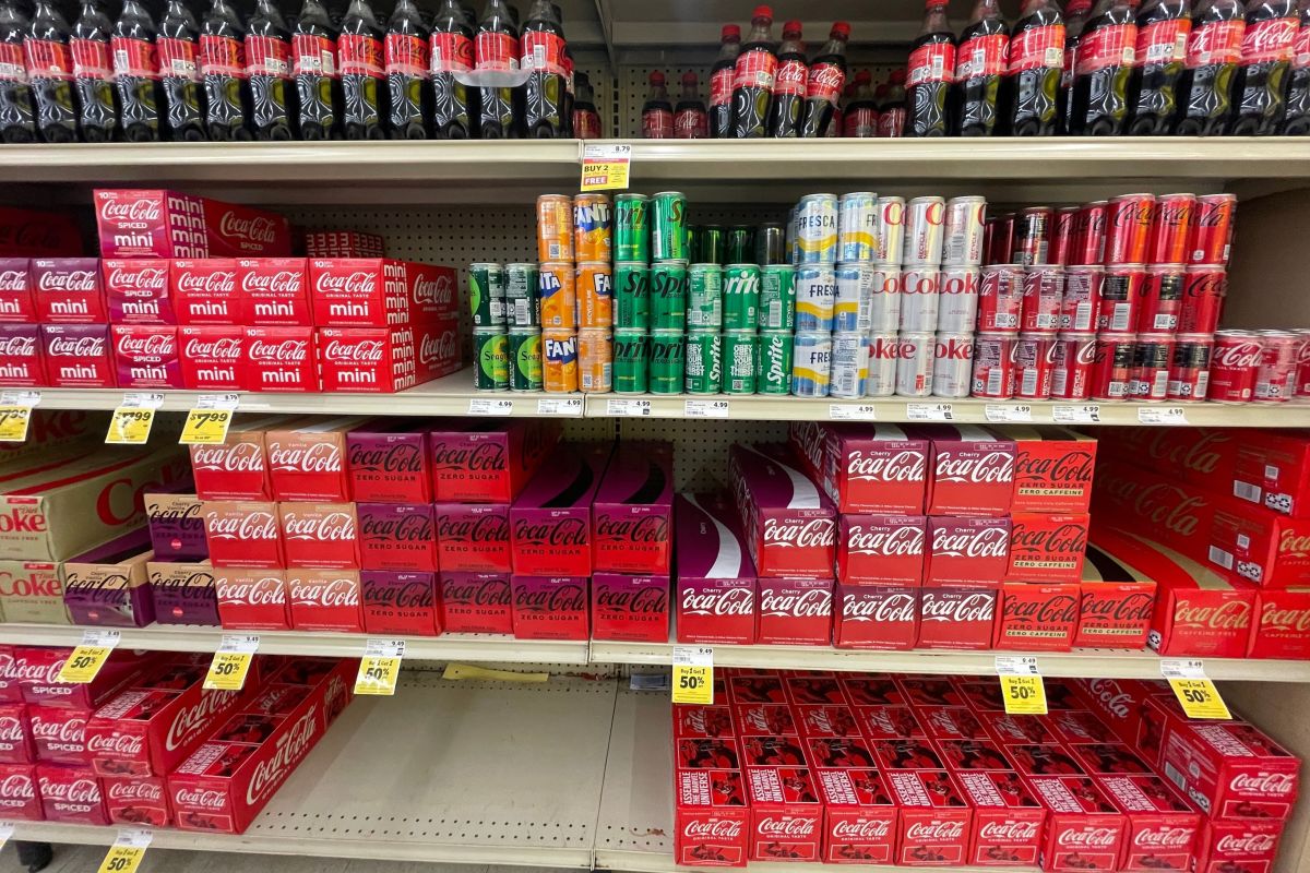 Harvey's Grocery store interior soda cola section Coke