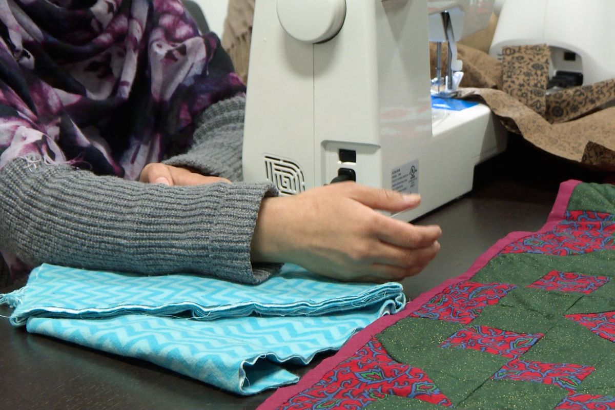 Afghan women take part in a sewing class at Exodus in Indianapolis.