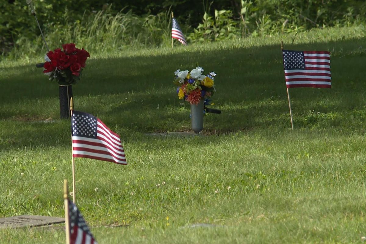 American flags and fresh flowers line the Valhalla cemetery to honor those who have served.