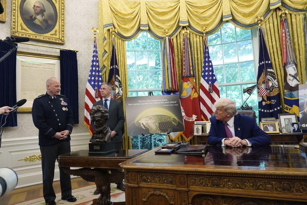 AP OK - President Donald Trump and Rep. Jim Banks, R-Ind., listen as Space Force vice chief of space operations Gen. Michael Guetlein speaks in the Oval Office of the White House, Tuesday, May 20, 2025, in Washington. (AP Photo/Alex Brandon)