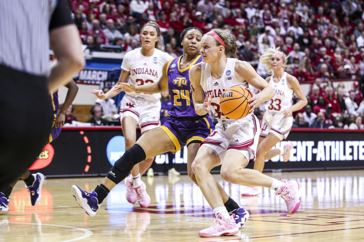 Indiana's Grace Berger drives the lane against Tennessee Tech's Jada Guinn during Saturday's NCAA game at Simon Skjodt Assembly Hall.