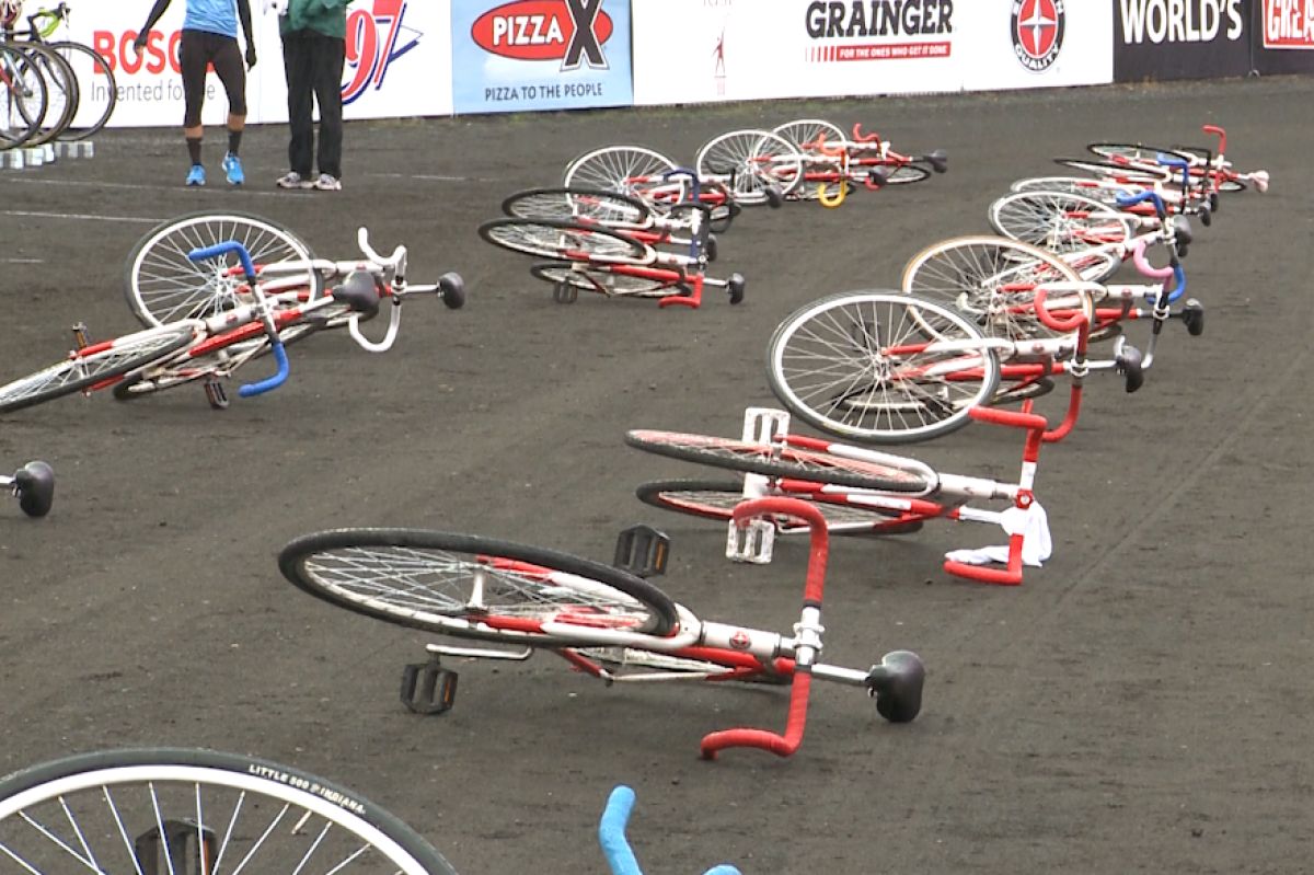 A photo of bikes lying down on the Little 500 track. 