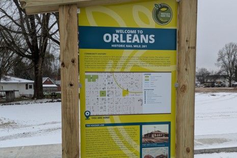 Trail sign reading "Welcome to Orleans"