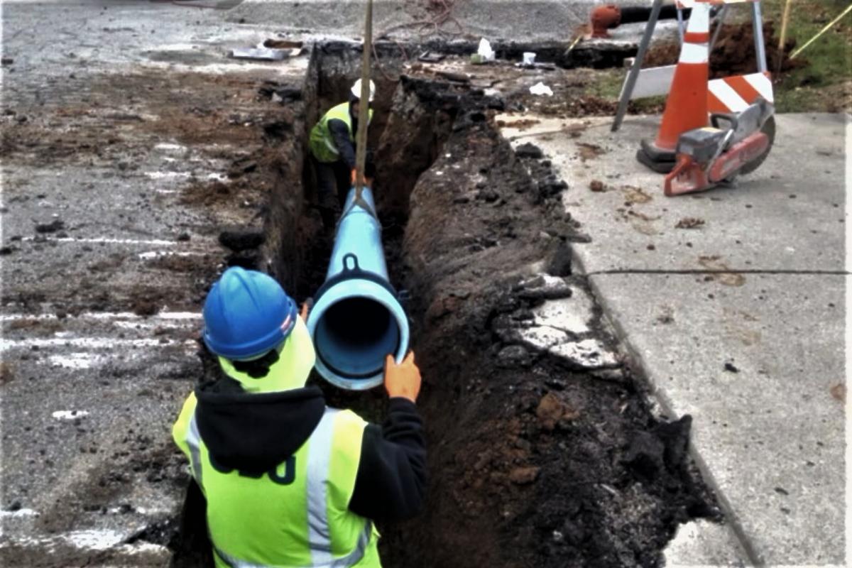 City of Bloomington employees replaces an underground water main. 
