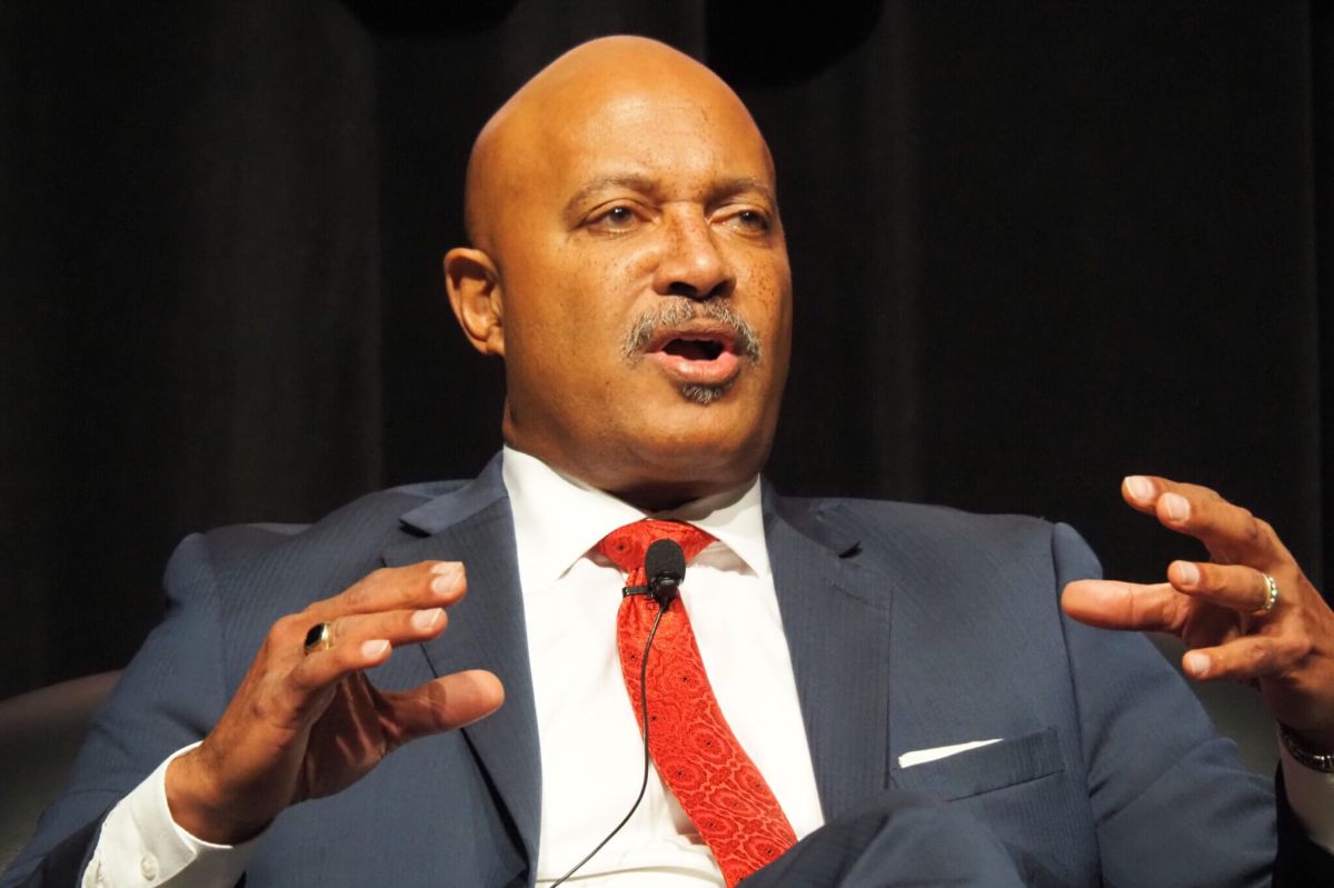 Curtis Hill speaks while on stage at the Dentons Legislative Conference