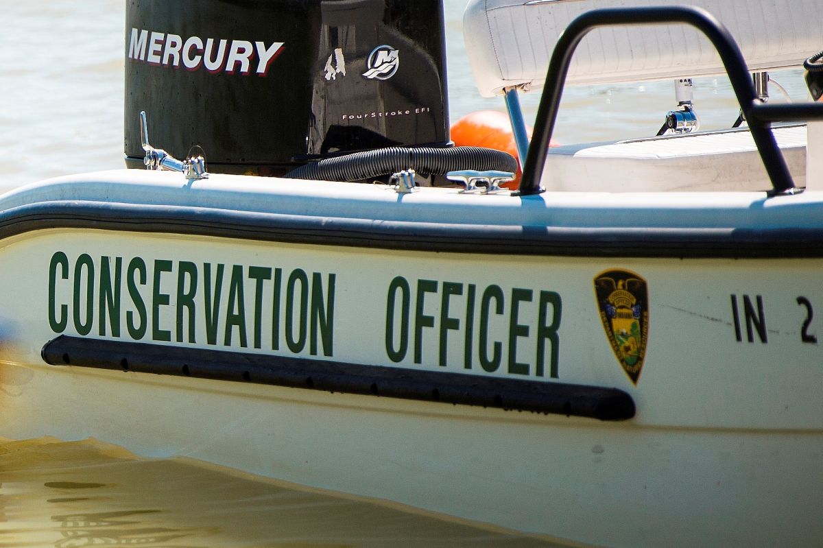 A DNR conservation officer's boat on the water. 