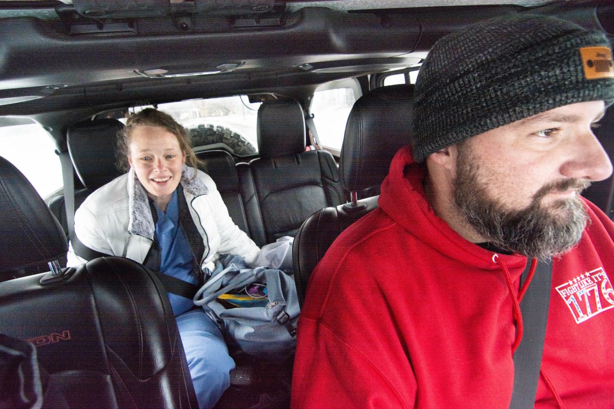 Kate Riordan, x-ray technologist, is given a lift home from Ryan Sermersheim Monday afternoon. While roads to her Evansville west side home weren't perfect that afternoon, they weren't drivable that morning — except by a lifted four-wheel drive. Serm