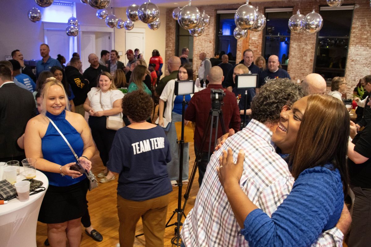 Evansville Mayor-Elect Stephanie Terry (right) hugs and takes photos with supporters after she claimed victory Nov. 7, 2023, with nearly 49-percent of the vote.