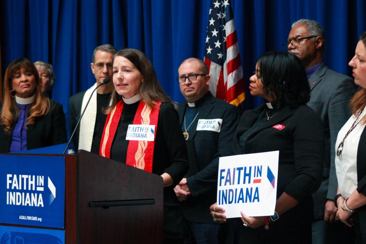 faith in Indiana speakers at lectern
