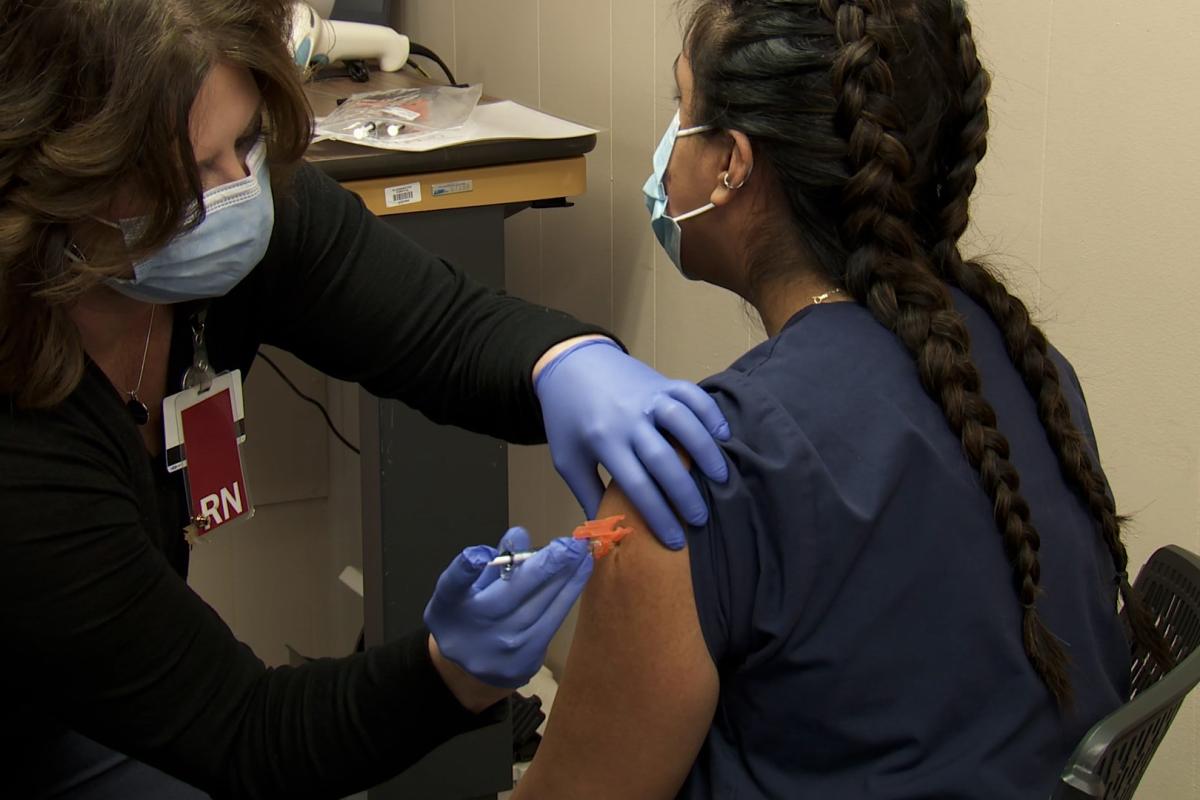A photo of Zaira Hernandez receiving Bloomington's first COVID-19 vaccine.