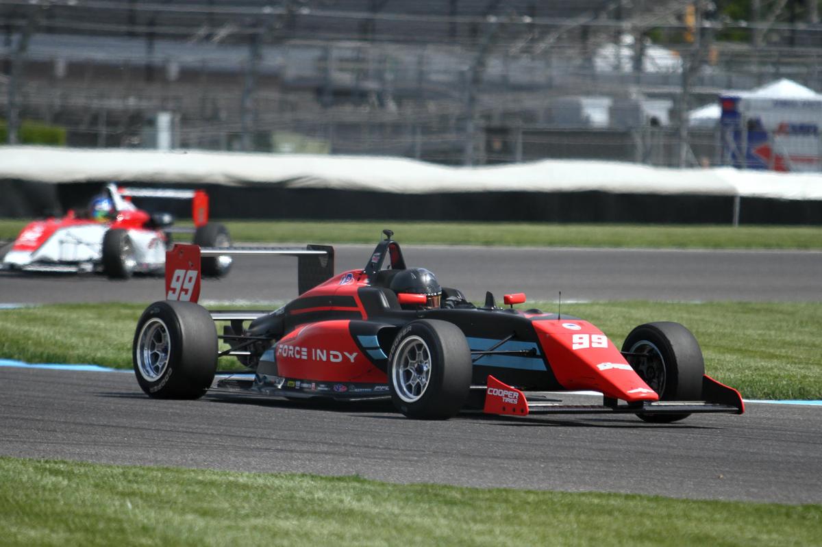 Force Indy driver Myles Rowe competes in the No. 99 car at the Indianapolis Motor Speedway.
